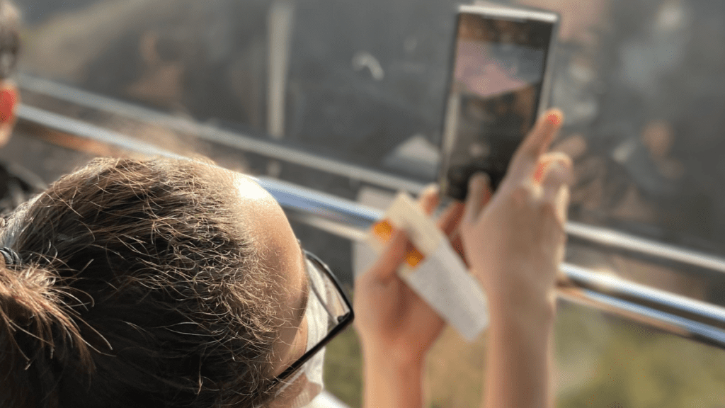 Taking a picture out the side of a Korean cable car