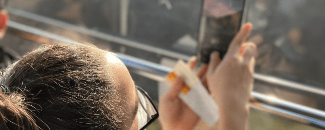 Taking a picture out the side of a Korean cable car