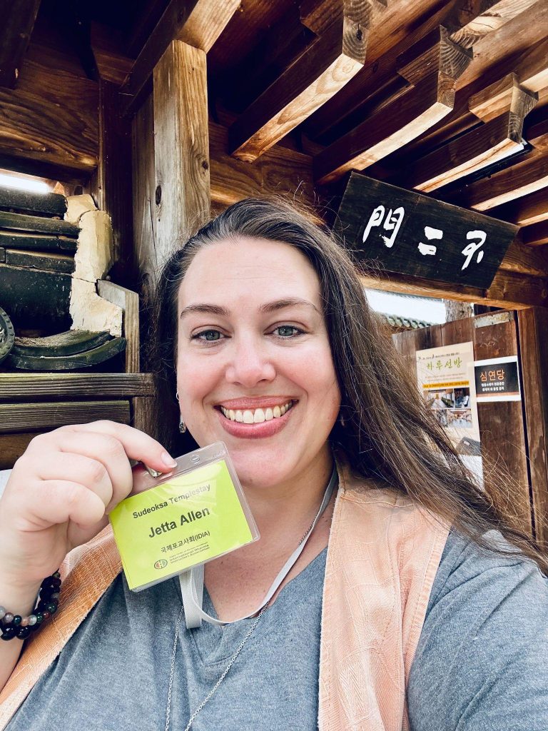 Sudeoksa Templestay participant holding her program name badge