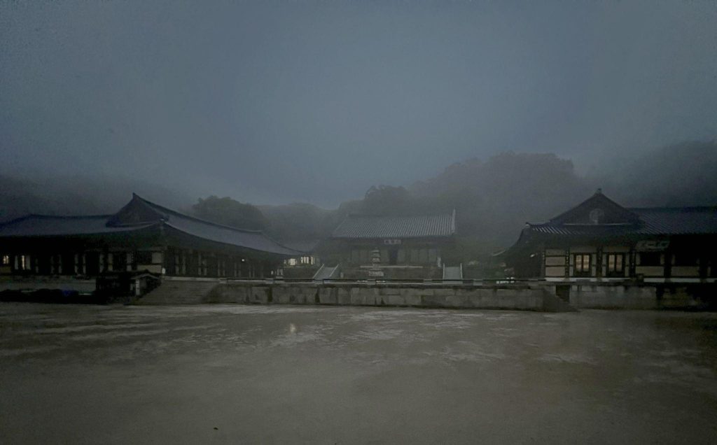 Sudeoksa Temple grounds before sunrise during an overnight Templestay