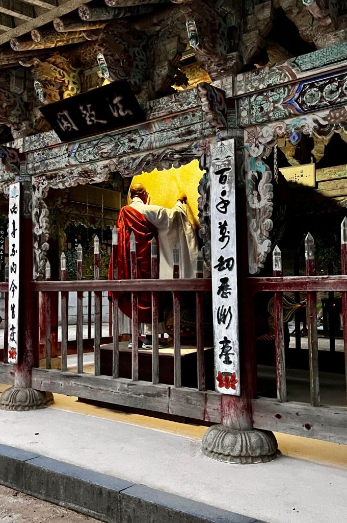 Buddhist ceremony inside a traditional hall at Sudeoksa Temple