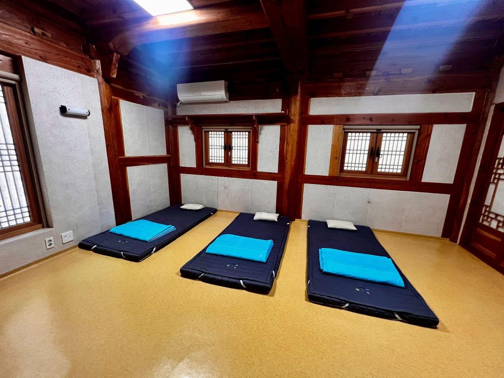 Traditional hanok-style sleeping accommodations during Sudeoksa Templestay